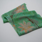 swirled green folded silk scarf