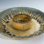 A ceramic platter and bowl created by Terry Plasket