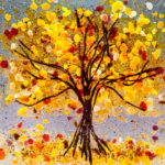 Fused glass panel of a tree with red and yellow autumn leaves by Katherine Cheetham