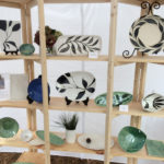 A display shelf of works created by Dorrie Papademetriou