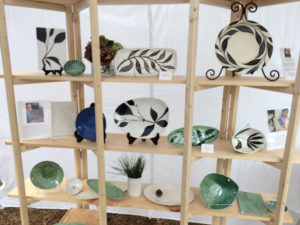 A display shelf of works created by Dorrie Papademetriou
