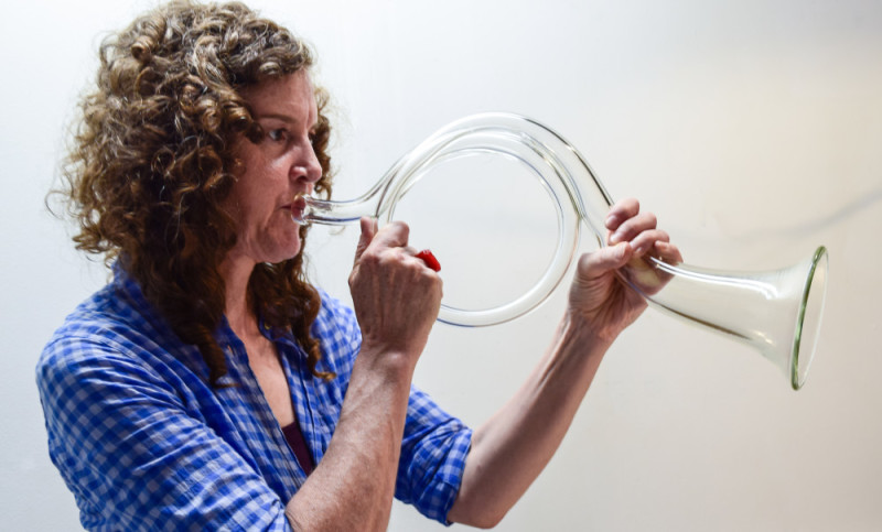 "Emanation 2019" Artist Martha McDonald practicing playing a glass horn.
