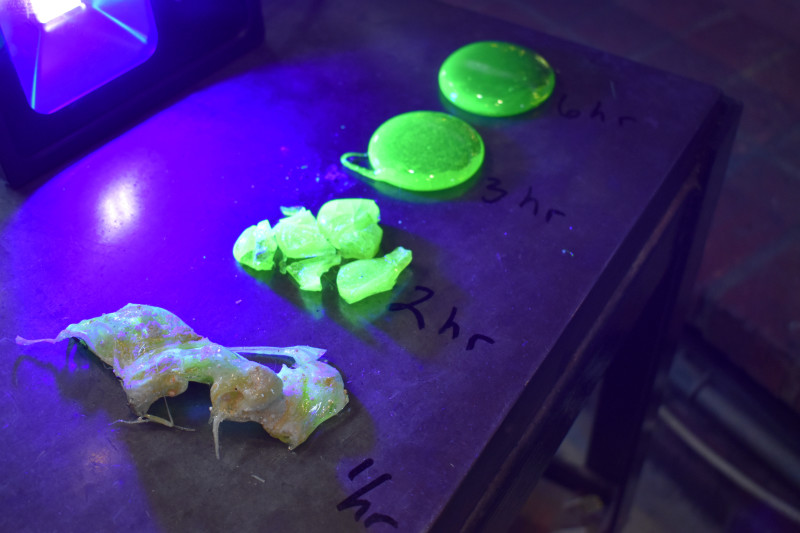 Four tests of uranium glass throughout the charging process to achieve the desired consistency and coloration.