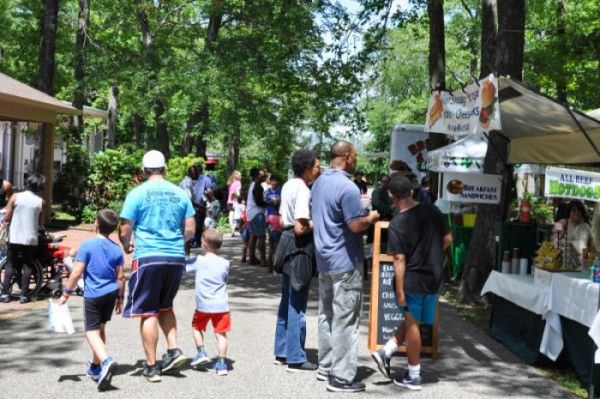 Families visiting food vendors at the Summer Antique and Food Market at WheatonArts