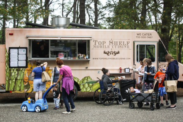 Top Shelf Mobile Cuisine truck serving visitors to the Summer Antique and food market at wheatonarts