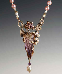 detail of a pearl necklace with an amethyst pendant by Harriet Forman Barrett