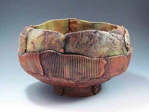 Green and copper color bowl by Amy Block