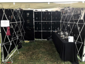 Booth showcasing the glass work of Stephen Brucker