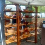 Booth showcasing the wood work of Thomas Cambria