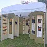 A booth displaying the leather goods of Jorge Gil