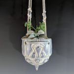 white and light blue ceramic plant hanger by Erika Novak and Drew Darley