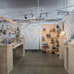Booth showcasing the ceramic works of Erika Novak and Drew Darley