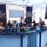 Booth displaying the leather goods of Lisa Strauss