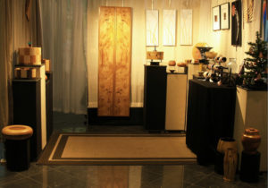 A booth showcasing the wood work of John Baun.