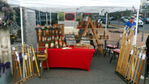 A booth showcasing the wood work of Thomas Ferrie.