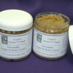 Two containers of Lavendar Sugar and Honey Scrub from Carol's Scents N' Soaps.