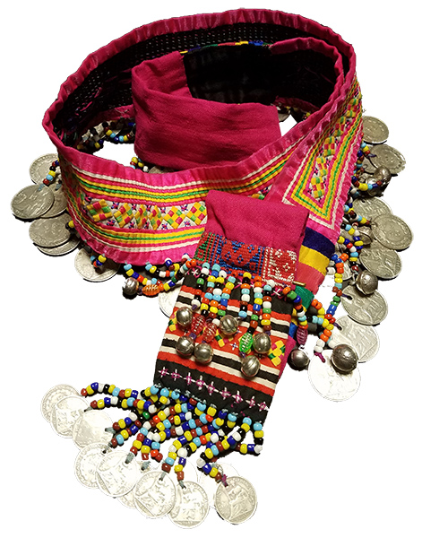 An embroidered, woven belt with coins hanging from the ends. The belt is a piece of Paj Ntaub work by Pang Xiong Sirirathasuk Sikoun.