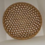 An overhead view of a basket woven by Mary May.