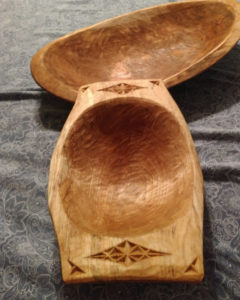 Two wooden vessels carved by Vincent Pettit.