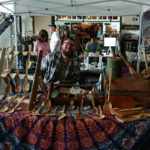 Booth showcasing the wood work of Vincent Pettit.