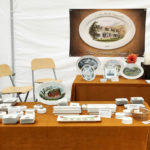 A booth showcasing the painted porcelain of Michelle Post.