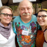 A photo of a smiling Rachel Marie Wenner, Steve Morse, and Colleen Larkin-Ayers at the Festival of Fine Craft.