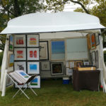 A booth showcasing the work of Simon Zeng.