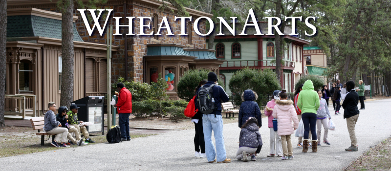 A crowd gathers together at WheatonArts.