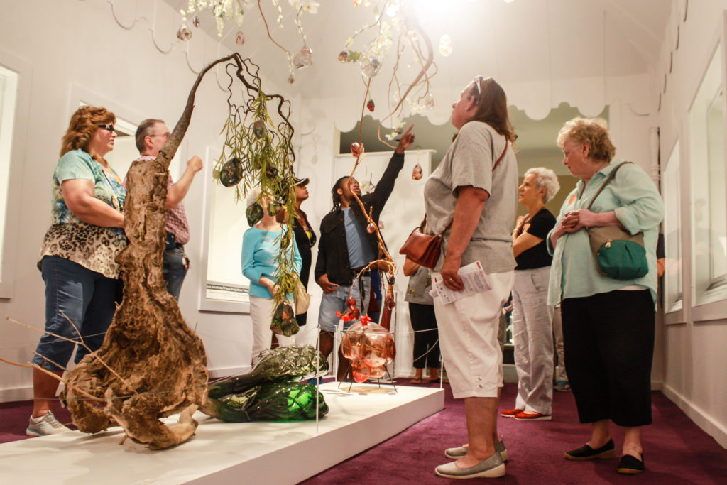 Visitors explore Jesse Krimes' "Strange Roots" during Emanation 2019.