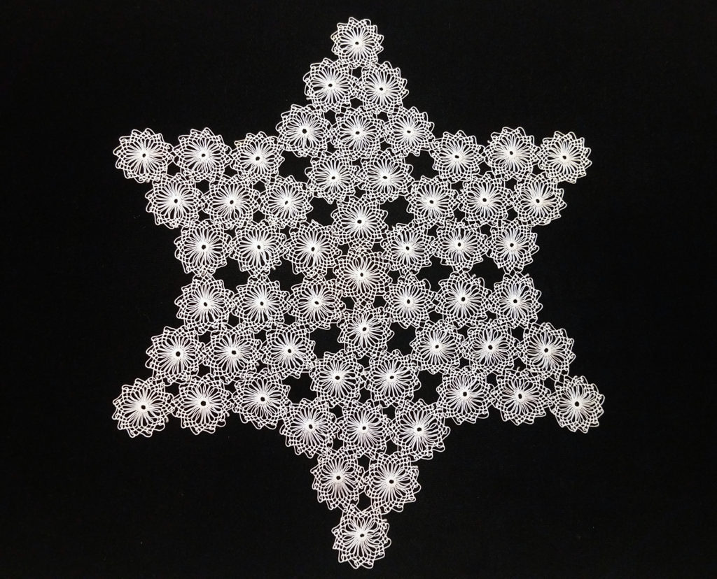 “Star of Davut” Doily, Ylvia Asal, 2002. Anatolian needle lace; floral motif. The white lace doilies are arranged into a Star of David design.
