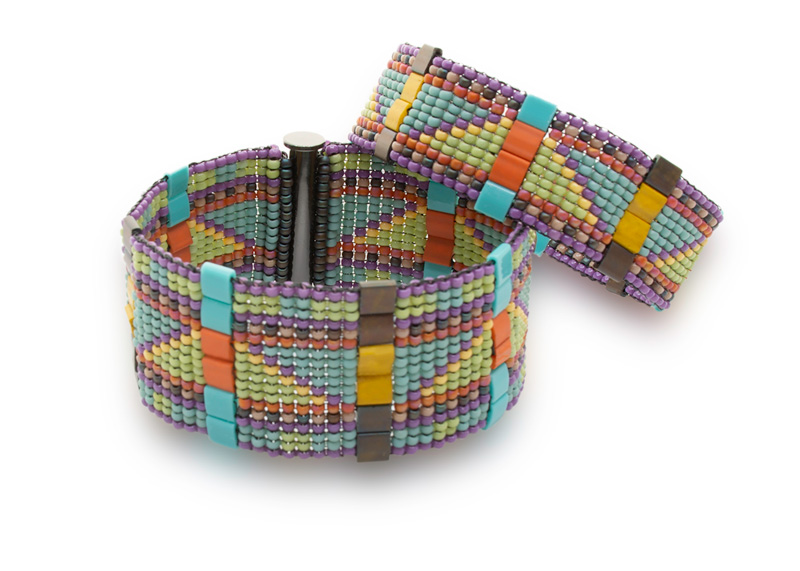 Two beaded bracelets in different thicknesses. Each bracelet has a matching pattern of pastel beads in purple, green, robin's egg blue, and yellow.