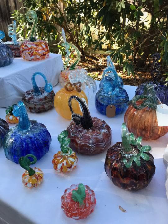 A collection of glass pumpkins in different colors by Jarryd Pezzillo.