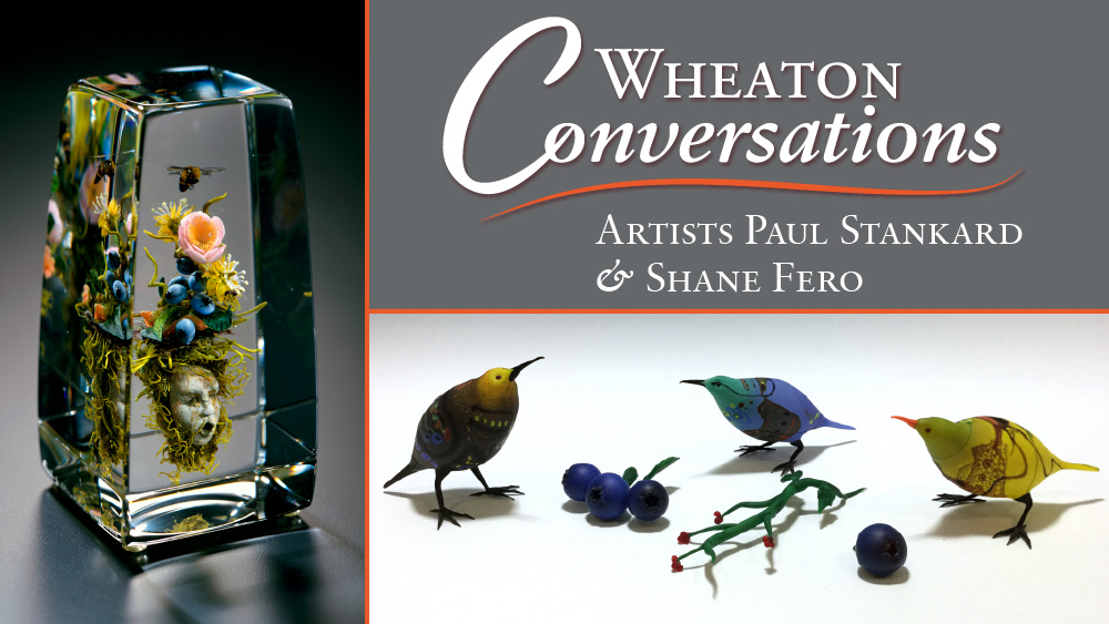 Wheaton Conversations: Artists Paul Stankard & Shane Fero. Two images: A tall rectangular transparent paperweight by artist Paul Stankard, with an intricate flamework sculpture of a stone head underneath a small bunch of flowers (left). Second image shows three small, colorful birds surrounding a little branch and small blueberries. Made by artist Shane Fero.