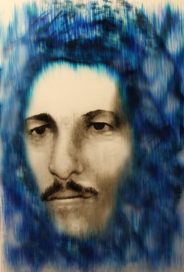 Eduardo, a painted face on glass by Paula Meninato.