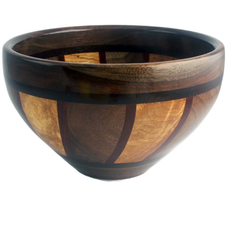 A wooden bowl with wide tan and dark brown stripes by Scott Foster.