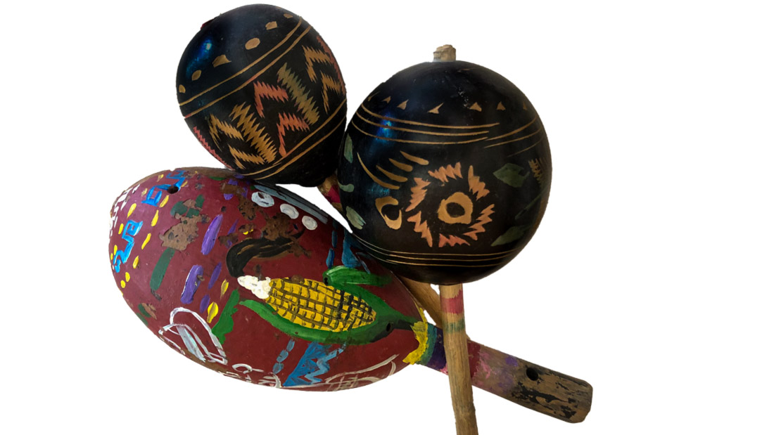 Three painted maracas from the collection of Yolanda Alcorta.
