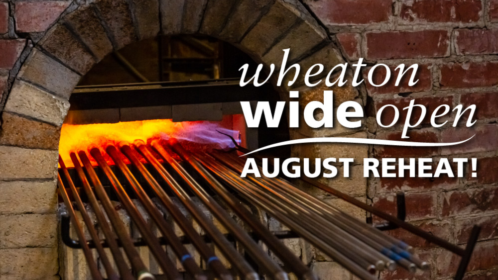 Banner image for "Wheaton Wide Open: August Reheat!" with free admission all August long. Image of a red bricked archway of the furance opening with flames heating up 16 metal blowpipes.