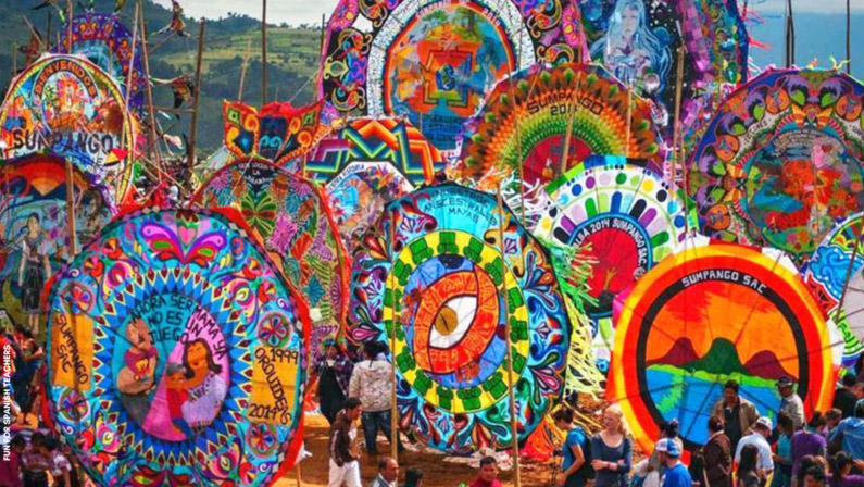 Several sacred kites for the Day of the Dead by Ubaldo Sanchez. Each kite is unique and multicolored.