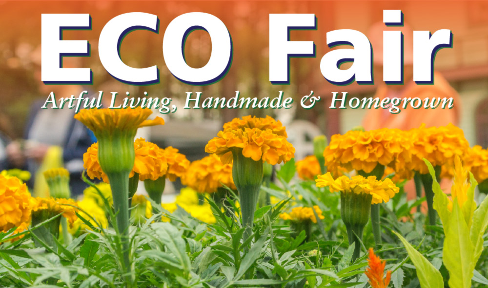 "ECO Fair" is in large text at the top of the banner. Below that, in the small text is "Artful Living, Handmade & Homegrown." The background is a close-up of a field of several flowers with bright yellow petals.