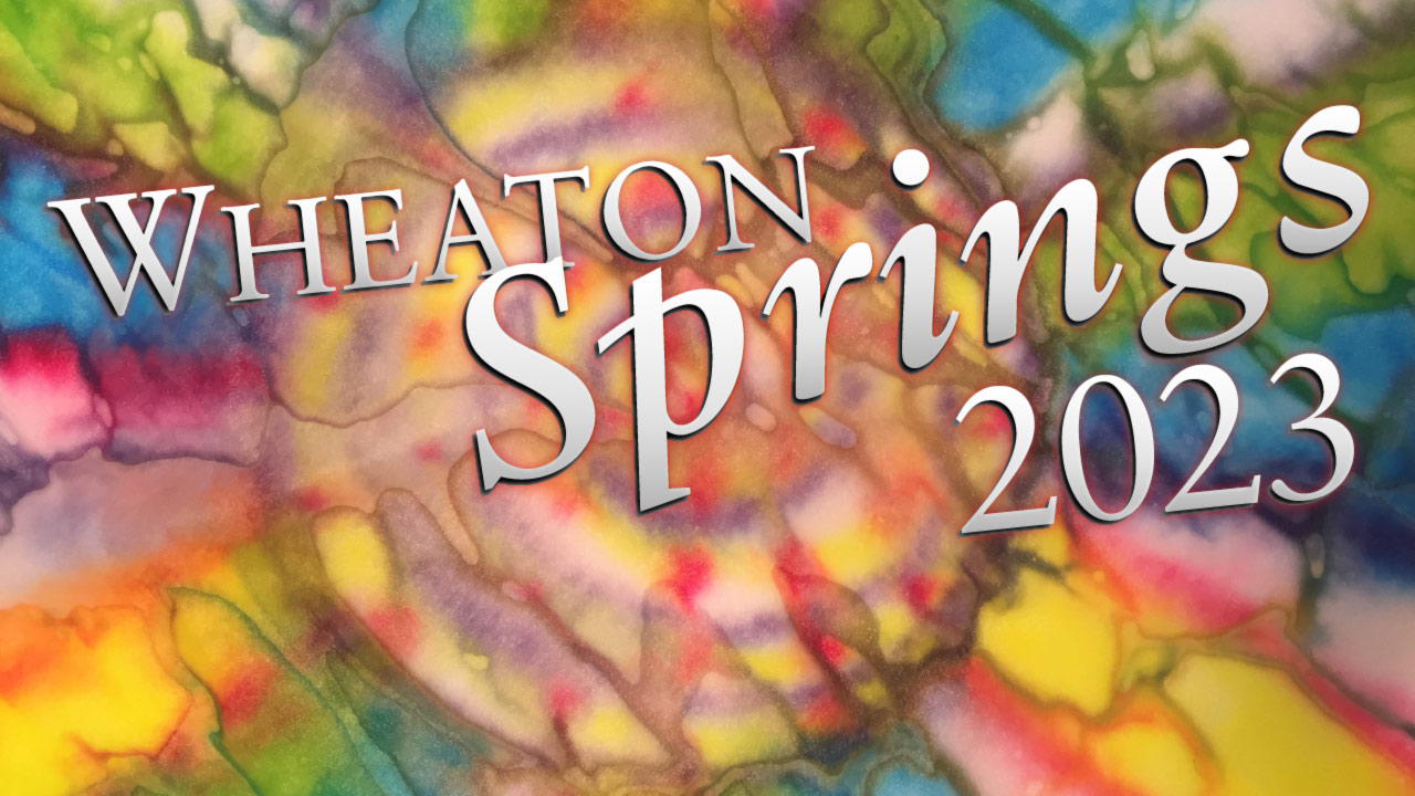 "Wheaton Springs 2023" is displayed in large white text across a multicolor spiral image.