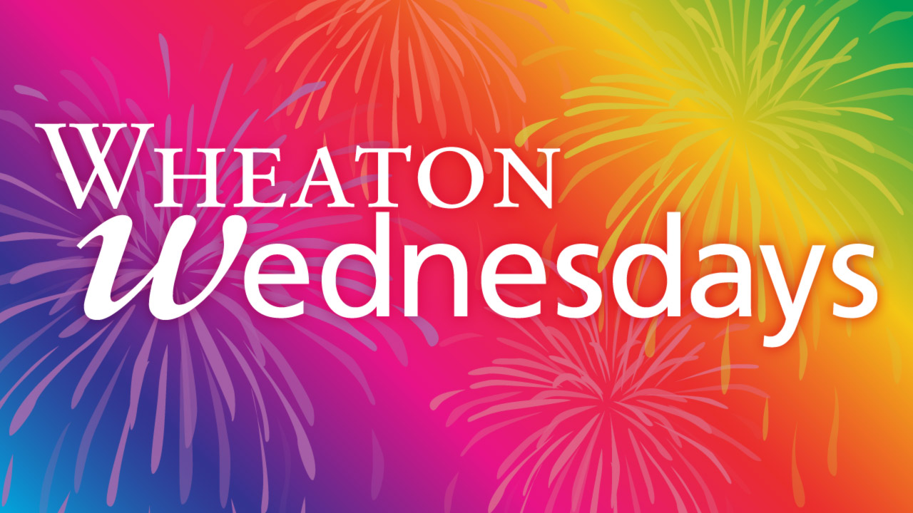 Image of the banner for Wheaton Wednesdays. "Wheaton Wednesdays" is displayed, in large white text, over a multicolored patterned background with four fireworks. The background is a diagonal gradient that starts in the bottom left corner with blue, turns to purple, then pink, red, orange, and yellow. The gradient ends with green in the top right corner after the yellow.