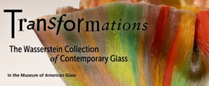 Image of the banner for "Transformations: The Wasserstein Collection of Contemporary Glass". The background of the banner is a close up image of a piece by Toots Zynsky. The image shows the left side of a colorful bowl-shaped glass pieces that folds and ruffles at the top. The piece is beige with bright light green, green, yellow, orange, and red thick vertical streaks throughout. At the top left side of the banner is black text that reads "Transformations" with smaller black text underneath that reads "The Wasserstein Collection of Contemporary Glass". There is smaller black text at the bottom left of the banner that reads "In the Museum of American Glass".